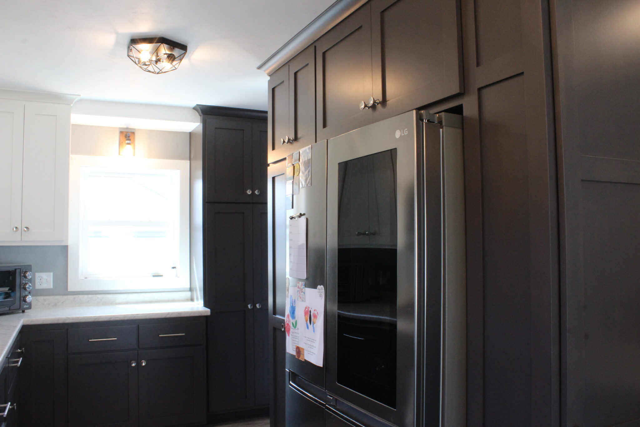 Contrasting Cabinetry And Design Kitchen Remodel in Manitowoc, WI by Bartow Builders project photo 15