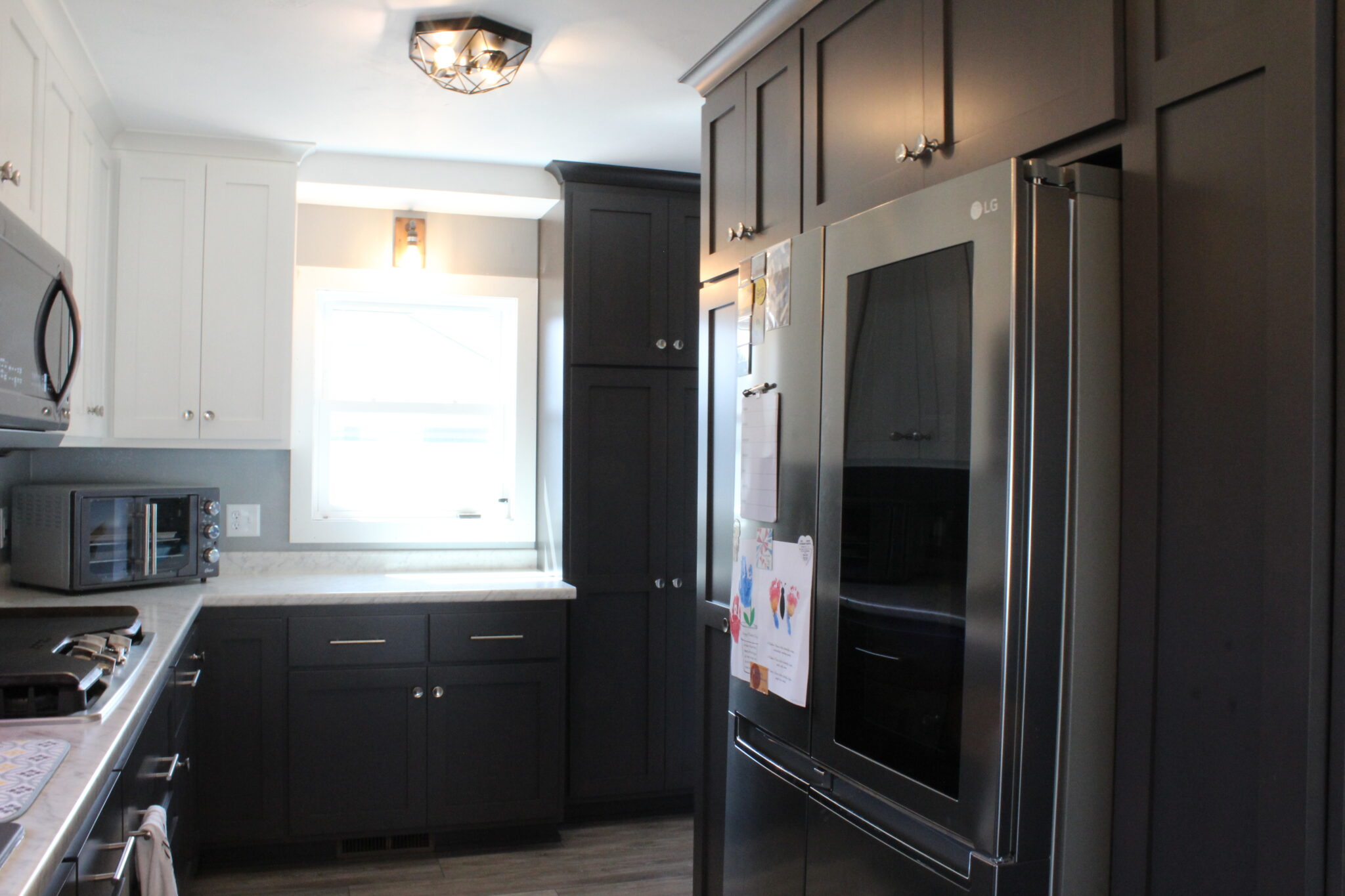Contrasting Cabinetry And Design Kitchen Remodel in Manitowoc, WI by Bartow Builders project photo 14