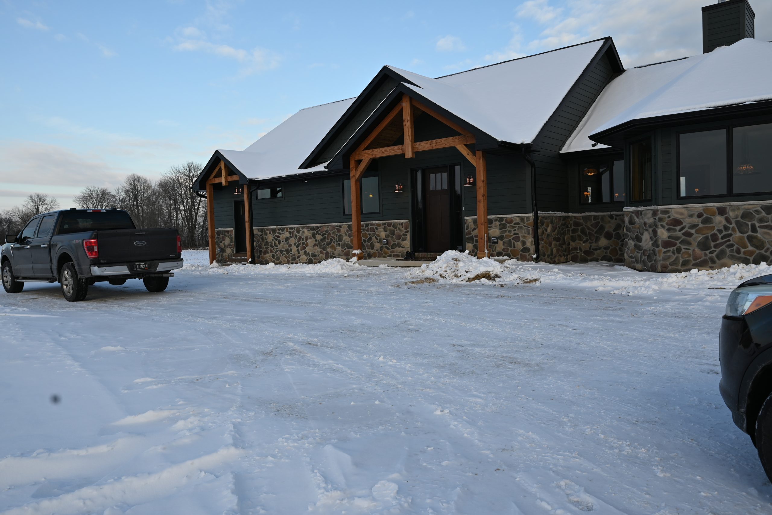 A Bartow Builders custom home exterior in winter, Manitowoc County