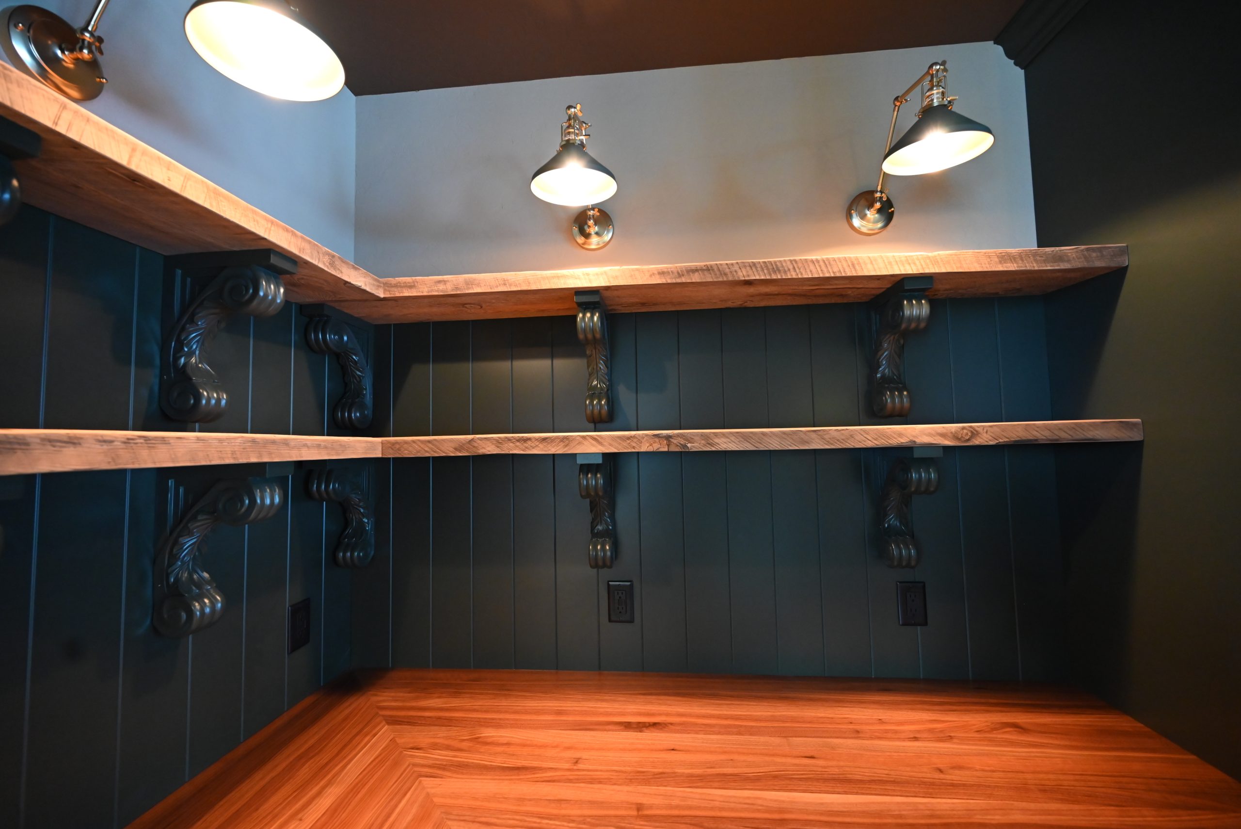 Open shelving and wood countertop in a Bartow Builders kitchen